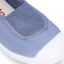 Cotton canvas kids Bamba type shoes with central elastic band and toe cap.