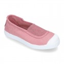 Cotton canvas kids Bamba type shoes with central elastic band and toe cap.