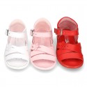 Washable leather sandal shoes with crossed strips and FLOWER for little girls.