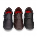 School shoes closed laceless and with toe cap in washable leather.