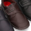 School shoes closed laceless and with toe cap in washable leather.