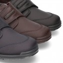 School shoes closed laceless and with toe cap in washable leather.