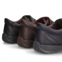 School shoes closed laceless and with toe cap in washable leather.