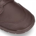 School shoes closed laceless and with toe cap in washable leather.