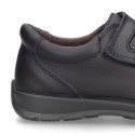 School shoes closed laceless and with toe cap in washable leather.