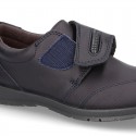 School shoes closed laceless and with toe cap in washable leather.