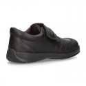 School shoes closed laceless and with toe cap in washable leather.