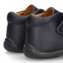 Ankle boot shoes with velcro strap in washable leather for little kids.