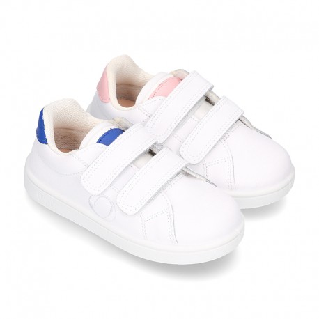 white tennis shoes with velcro straps