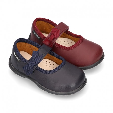 School shoes Mary Jane style with velcro strap with bow in washable leather for little girls.