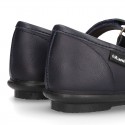 School shoes Mary Jane style with hook and loop strap and bow in washable leather for girls.