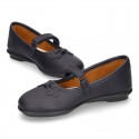 School shoes Mary Jane style with hook and loop strap and bow in washable leather for girls.