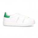 New trendy casual tennis shoes with green counter.