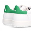 New trendy casual tennis shoes with green counter.