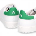 New trendy casual tennis shoes with green counter.