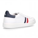 Casual washable leather kids tennis shoes with flag design.