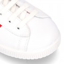 Casual washable leather kids tennis shoes with flag design.