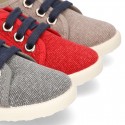 New WASHED EFFECT canvas tennis style shoes with flag detail.