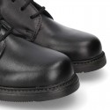 Zapato colegial tipo Blucher con cordones en piel lisa Boxcalf.