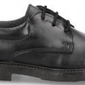 Zapato colegial tipo Blucher con cordones en piel lisa Boxcalf.