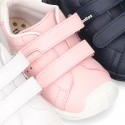 New Washable leather Tennis shoes with dual velcro strap and reinforced toe cap and counter for first steps.