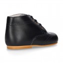 Classic Nappa leather ankle boots to dress with chopped design for first steps.