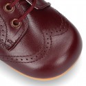 Classic Nappa leather ankle boots to dress with chopped design for first steps.