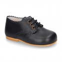 Classic little LACES UP style shoes in nappa leather with scallop.