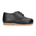 Classic little LACES UP style shoes in nappa leather with scallop.