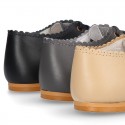 Classic little LACES UP style shoes in nappa leather with scallop.