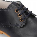 Classic little LACES UP style shoes in nappa leather with scallop.