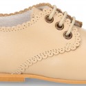 Classic little LACES UP style shoes in nappa leather with scallop.