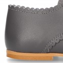 Classic little LACES UP style shoes in nappa leather with scallop.