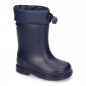 Little rain boots with adjustable neck and WOOL KNIT lining.