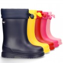 Little rain boots with adjustable neck and WOOL KNIT lining.