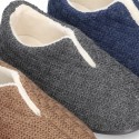 New structured wool knit home shoes with central opening.