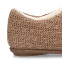 New structured wool knit home shoes with central opening.