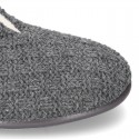 New structured wool knit home shoes with central opening.