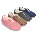 New structured wool knit home shoes with central opening.