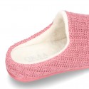 New structured wool knit home shoes with opened shape.