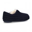 New closed Home shoes in wool knit with central opening.