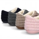 New closed Home shoes in wool knit with central opening.