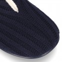 New closed Home shoes in wool knit with central opening.