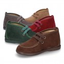 Autumn Canvas ankle booties wallabees style with ties closure.