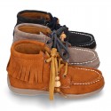 INDIAN style ankle boots with fringed design in suede leather.