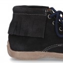 INDIAN style ankle boots with fringed design in suede leather.