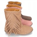 Suede leather boot shoes with fringed detail for toddler girls.
