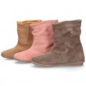 Suede leather boot shoes with fringed detail for toddler girls.