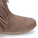 Suede leather boot shoes with fringed detail for toddler girls.