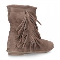 Suede leather boot shoes with fringed detail for toddler girls.